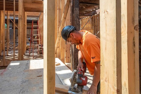 Detroit, Michigan - Jay Newcomb III helps rehab a long-vacant and crumbling commercial building in