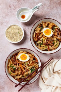 Buckwheat noodles soba with shimeji mushrooms, with boiled egg, green onion, sesame seeds,