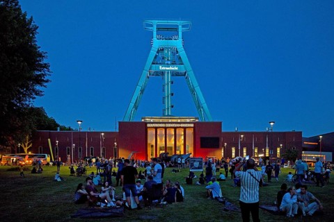 People in front of the German Mining Museum for the Extra Shift at night, Bochum, Ruhr Area, North