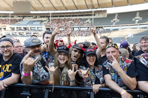 Fans in the front row in front of the concert of AC/DC live on Power Up Tour 2025 at the