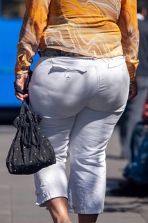 Woman walking in the street, From behind, Obesity, City of Quito. Pichincha province, Ecuador,