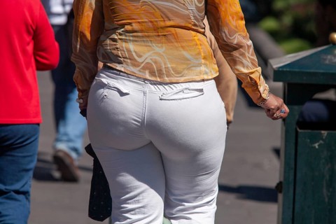 Woman walking in the street, From behind, Obesity, City of Quito. Pichincha province, Ecuador,