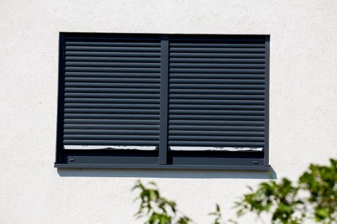 Electric aluminium roller shutter on a residential building