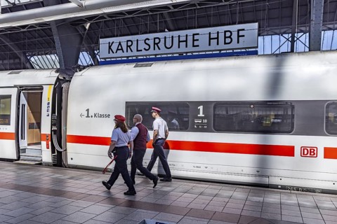 Karlsruhe main station with ICE and employees of Deutsche Bahn AG. Karlsruhe, Baden-Württemberg,