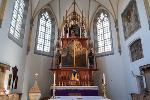 Altar of the parish church of St John the Baptist, rebuilt after a fire in 1872 in neo-Gothic