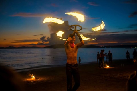 Fire show, jugglers with fire, Ao Nang Beach, sunset, Ao Nang, Krabi, Thailand