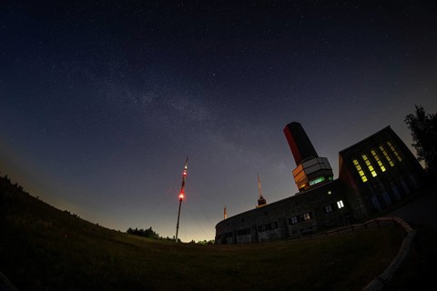 The Milky Way passes over the summit of the Großer Feldberg in the Taunus, near Frankfurt am Main,