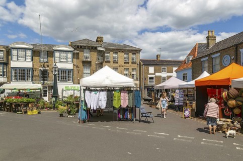 Market stalls in Market Place, town centre of Southwold, Suffolk, England, UK