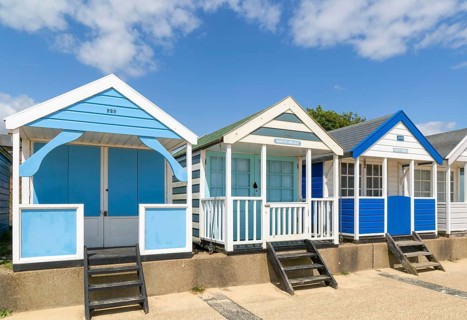 Seaside beach huts on the seafront at Southwold, Suffolk, England, UK
