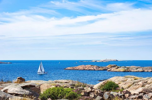 Archipelago with sailing boats off the coast of Lysekil, Bohuslän, Västra Götalands län, Sweden,