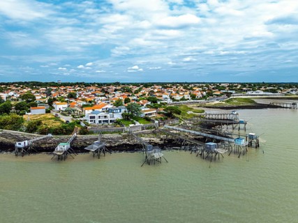 Fishing huts over Randonnee entre Histoire et Nature from a drone, Fouras, Fouras-les-Bains,
