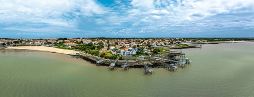 Panorama of Fishing huts over Randonnee entre Histoire et Nature from a drone, Fouras,
