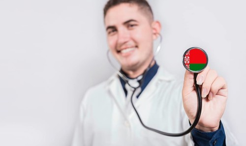 Doctor showing stethoscope with Belarus flag. Belarus national healthcare concept