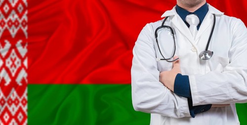 Male doctor with stethoscope on Belarus flag. Doctor holding stethoscope on Belarus flag