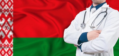 Belarus healthcare concept. Male doctor on Belarus flag. Doctor with crossed arms on Belarus flag