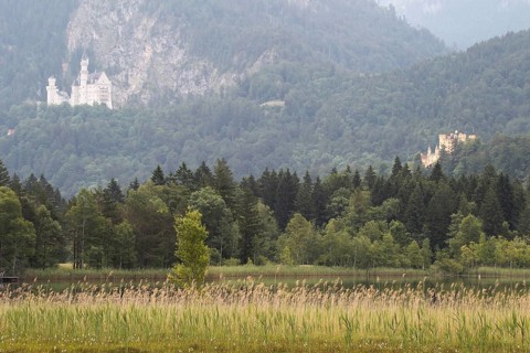 Neuschwanstein Castle and Hohenschwangau Castle (right) with Lake Schwansee in the foreground,