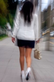 Woman walking in street, Photo with motion blur, City of Quito, Pichincha province, Ecuador, South