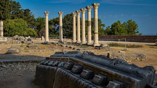 View of ancient ruins with columns in a historical setting under a clear sky, Temple of Apollo,