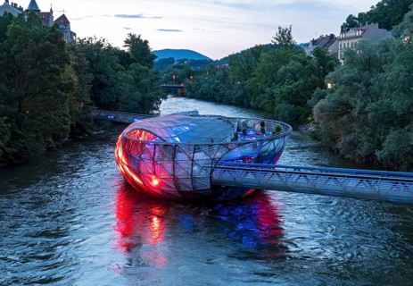 Murinsel floating island on the river Mur by night, Graz, Austria