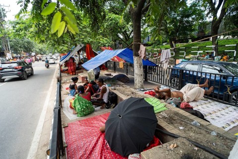 Devotees staying in street divider as they arrives to visit Kamakhya Temple during Ambubachi Mela,
