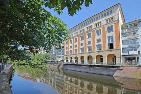 Melanchthonhaus with arcade built in 1914, reflection, Enz, river bank, Pforzheim, Northern Black