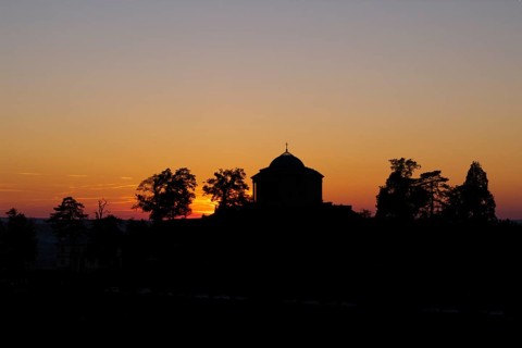 Silhouette of a chapel with trees in the sunset, quiet and peaceful atmosphere, Zum Württemberg,