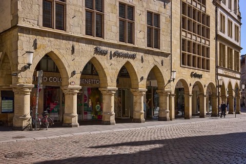 Old town, historic buildings, arcades, facade, window, lamp, wall anchor, cobblestone street,
