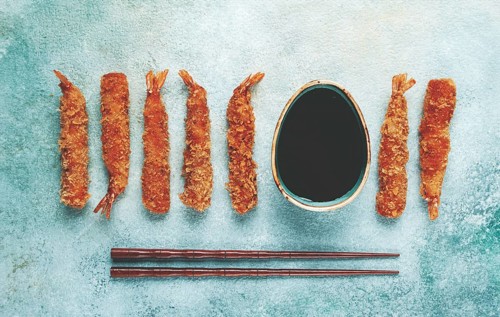 Fried tiger prawns in tempura, top view, soy sauce, chopsticks