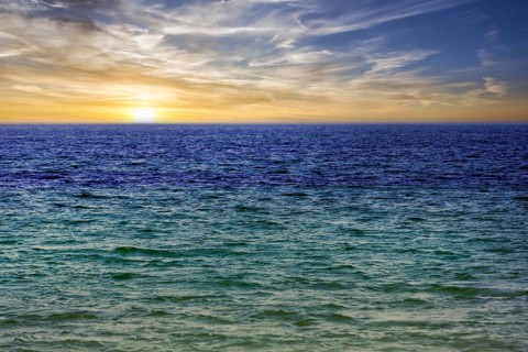 Turquoise blue sea, calm water surface, sunset, offshore island of Heligoland, Schleswig-Holstein,