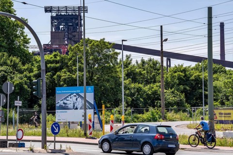 Construction site sign for thyssenkrupp Steel's first direct reduction plant, the climate-neutral