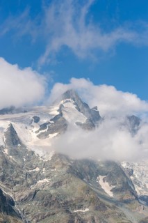 View from Franz Joseph Höhe into the mountains (Großglockner) with Pasterze on a sunny day at