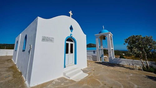 Chapel of Agios Charalambos, White chapel with blue detail and free-standing bell tower, Kefalos,