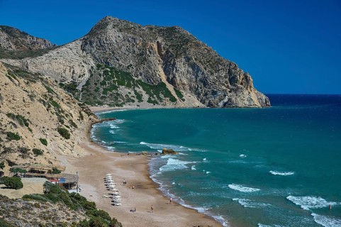 Beach, Kavo Paradiso, Paradise Beach, bay with sandy beach, surrounded by rocky coast and blue sea,