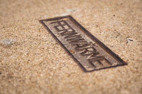 Sign for district heating on a manhole cover in Wuppertal, Germany
