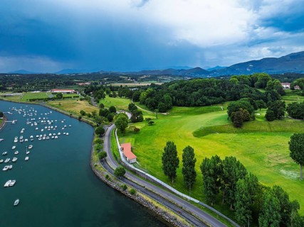 Sunset and storm clouds over Pyrenees and Saint-Jean-de-Luz from a drone, Nouvelle-Aquitaine,
