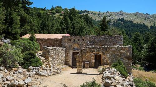 A small ancient ruin complex in a wooded area under a sunny sky, Abandoned Village, Lost Place,