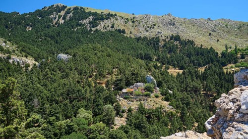 Lush wooded hills and mountains under a blue sky, Abandoned village, Lost place, Pyli, Paleo Pyli,