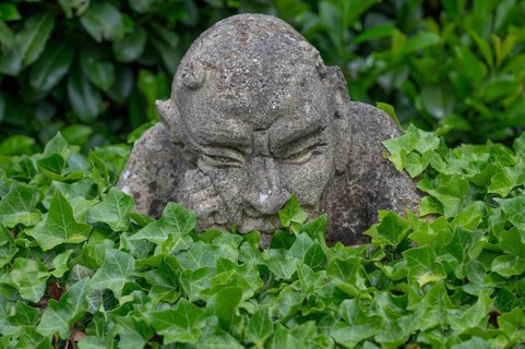 Stone sculpture, grotesque in a garden, Bavaria, Germany