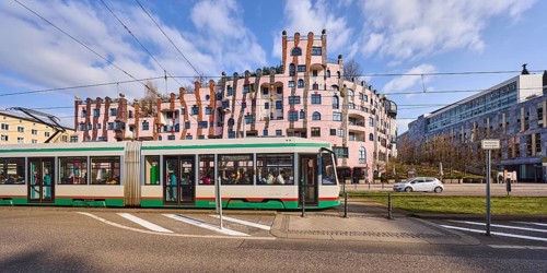 Green Citadel, architect Friedensreich Hundertwasser, modern architecture, tram, overhead lines,