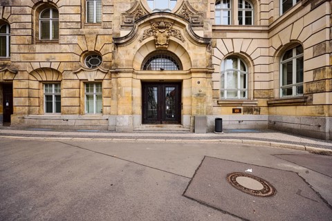 Old town, sandstone building, facade, window, entrance area, door, staircase, public order office,