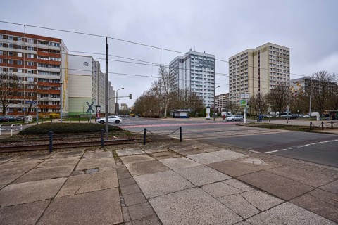 High-rise buildings, residential buildings, residential silos, tram tracks, overhead lines, diffuse