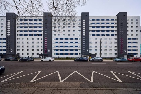 High-rise building, residential building, residential silo, façade with windows, colour line