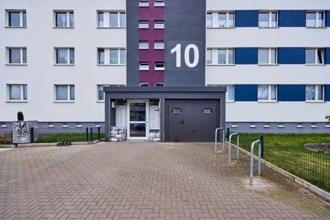 High-rise building, residential building, façade, entrance area, window, door, house number,