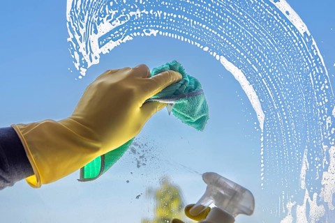 Glass cleaning: Close-up of a window pane being cleaned