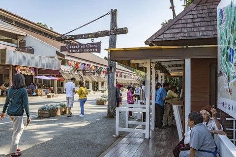 Visitors line up to purchase admission tickets to various parts of the Doi Tung tourist attraction