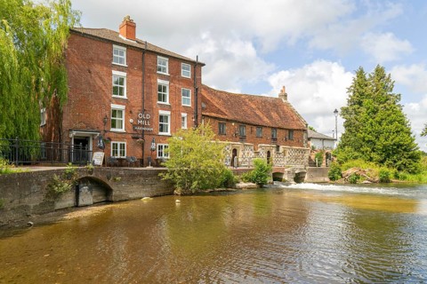 Historic buildings Old Mill Harnham, River Avon, Harnham, Salisbury, Wiltshire, England, UK