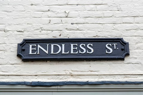 Sign on wall for Endless Street, Salisbury, Wiltshire, England, UK