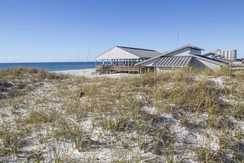 National Park Service sign welcomes visitors to the Rosamond Johnson Jr. Beach in the Perdido Key