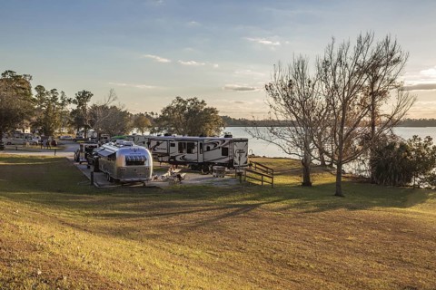 Recreational vehicles parked on the bank of Lake Seminole in the Corps of Engineers Eastbank
