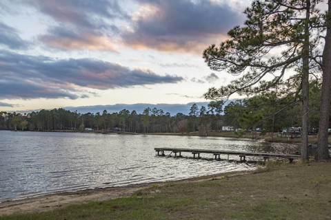 Campers on Geiger Lake in Paul B. Johnson State Park near Hattiesburg, Mississippi, USA